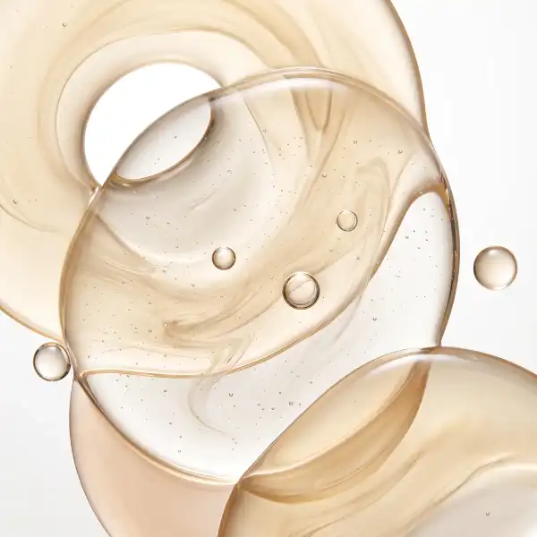 Close-up of layered serum textures and bubbles